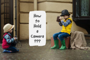 how to hold a camera